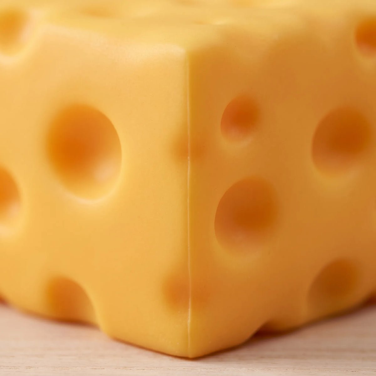 Close-up of the moulded holes and rounded corner of the big cheese squishy