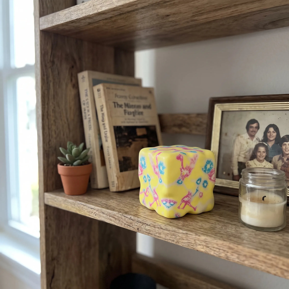 Flower yellow cheese squishy block styled in a bright room